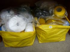 Two bags containing an enormous parcel of knitting machine spools