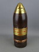 World War I armament's shell with applied plaque titled 'Dardanelles, October 1915, shell fired by