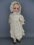 Vintage Armand Marseilles porcelain headed doll, incised to the back 'Made in Germany, Floradora,