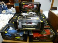 Ten boxed Burago scaled diecast vehicles and one unboxed