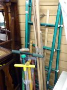 Parcel of various long handled garden tools, metal framed stepladder, galvanized watering can and