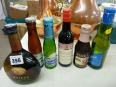 Collection of vintage Babycham and other drinks bottles