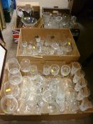 Four boxes containing a large collection of drinking glassware and miscellaneous glassware