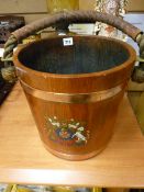 Vintage coppered oak bucket with rope handle and coat of arms
