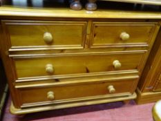 Modern pine two over two drawer chest