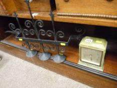 Onyx mantel clock and a wrought iron candle sconce