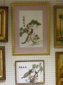 Two framed Oriental embroidered panels