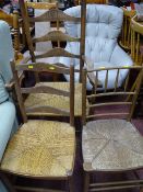 Rush seated ladderback elbow chair and two other similar rush seated chairs