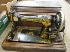 Cased vintage Singer hand crank sewing machine