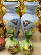 Pair of Victorian enamel decorated milk glass vases along with a smaller floral painted pair