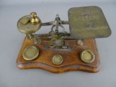 Vintage set of brass postal scales