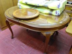 Oval hardwood extending dining table with two extra leaves and a 'Lazy Susan'