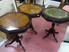 Drum top hexagonal occasional table with leather tooled insert and two others similar