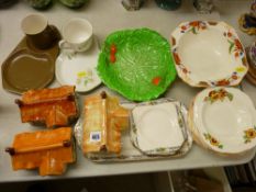 Three pottery house moneyboxes, a Carltonware leaf decorated bowl, a pottery fruit set etc