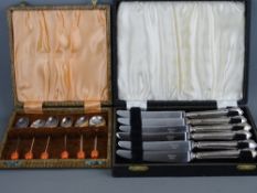 Cased set of six silver handled knives and a boxed set of six EPNS cocoa bean coffee spoons