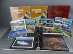 Four volume collection of vintage and later postcards including a good group of early views of