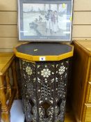 Octagonal topped Eastern style occasional table with picture 'Back from the Indies'