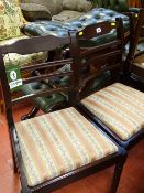 Modern extending dining table by Strongbow Furniture and four matching classically upholstered