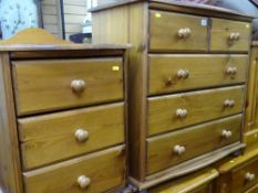 Modern dark pine two over three drawer chest with railback, a similar three drawer chest with