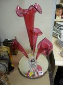 Four fluted epergne on a bevelled glass mirrored base