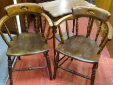 Pair of spindleback tub chairs and an occasional table