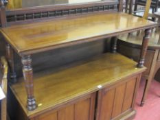 Edwardian mahogany dumb waiter with gallery back on turned shelf supports and with lower cupboard