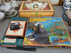 Boxed child's teaset, a vintage Monopoly and Scrabble board games etc