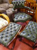 Green button backed upholstered captain's chair with two 'X' framed footstools