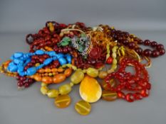 Chunky turquoise necklace, quantity of amber and amber colour examples with other costume