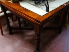Polished wood draw leaf table on barley twist supports