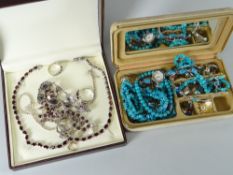 Two small jewellery boxes containing mainly Indian silver jewellery Condition reports provided on
