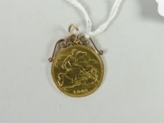 A gold half sovereign 1902 mounted to pendant suspension Condition reports provided on request by