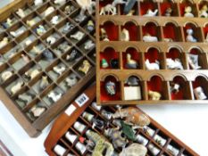Three racks of thimbles, Wade Whimsies and other miniature ornaments Condition reports provided on