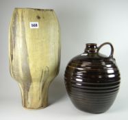 A studio pottery vase with narrow base and open neck, 39cms high together with a studio pottery