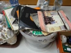 A tub of single vinyl records Condition reports provided on request by email for this auction