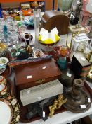 A tray of decorative glass and mixed items including crucifix, Black Forest style carved Friar