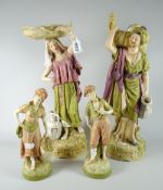A pair of Royal Dux pottery models of market traders in Arabian clothing on naturalistic bases,