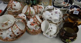 A parcel of mixed teaware including Royal Albert and two copper lustre jugs Condition reports