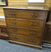 A vintage oak chest of four graduated drawers with swan neck handles, 91cms wide Condition reports