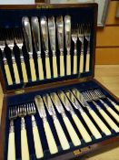 Cased complete set of twelve EPNS fish knives and forks in fitted case with brass inlaid shield