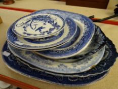 A collection of various blue & white plates and platters Condition reports provided on request by