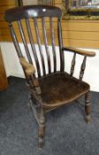 A good antique Windsor country type armchair and two smaller country farmhouse chairs Condition