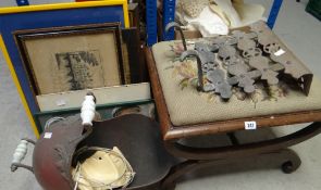 A vintage cross legged stool with a floral cross stitch decorated cushion, helmet coal scuttle,