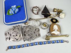 An interesting jewellery lot including a rounded rectangular silver framed cameo brooch of a choir