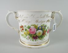A Staffordshire porcelain (possibly Coalport) loving cup to commemorate Rev. Hugh Pugh of Mostyn (