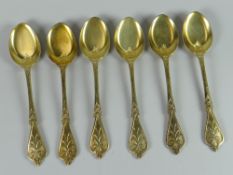 A set of six Victorian silver gilt teaspoons by George Adams for Chawner & Co, of floral design, the