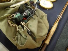 A Martin James vintage split cane two-piece fly fishing rod with cork handle and canvas bag pack