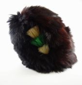 An early to mid-twentieth century British military bear skin helmet with wicker internal