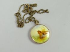 9ct yellow gold framed Royal Worcester porcelain pendant painted with a single perched robin, signed