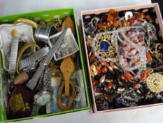 A box of costume jewellery and a box of small collectables including watch, love spoon, loose bank
